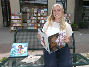 Madeline Antony poses in northwest Calgary on  Saturday, July 11, 2020.  Antony is one in a group who are raising money to purchase books that are written by authors or feature characters from the Black, Indigenous and people of colour (BIPOC) communities for elementary schools.