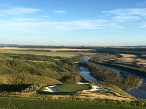 The signature hole at Links of GlenEagles in Cochrane is No. 16, a Par-3 perched above the Bow River. (Wes Gilbertson/Postmedia)
