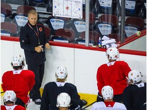 Jul 13, 2020; Calgary, Alberta, CANADA; Calgary Flames head coach Geoff Ward talking to the players during a NHL workout at Scotiabank Saddledome. Mandatory Credit: Sergei Belski-USA TODAY Sports ORG XMIT: USATSI-429295