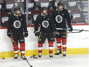 Flames Mark Giodano, TJ Brodie and Connor Mackey (L-R) during Calgary Flames training camp a the Saddledome in Calgary on Tuesday, July 14, 2020. Jim Wells/Postmedia