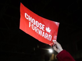 A supporter holds up a sign as Liberal leader Justin Trudeau holds a rally in Montreal on Thursday Oct. 17, 2019.