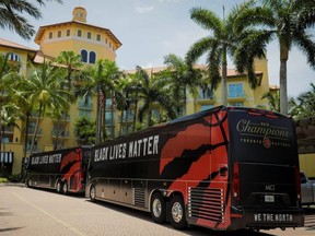 The Raptors have Black Lives Matter displayed on the sides of their buses, and the team is planning a pre-game statement on the subject. Reuters