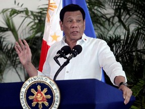 Philippines President Rodrigo Duterte speaks after his arrival, from a visit in Israel and Jordan at Davao International airport in Davao City, Sept. 8, 2018.