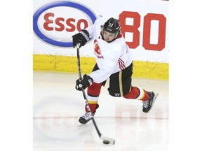 Calgary Flames sniper Johnny Gaudreau fires a shot during training camp at the Saddledome on Thursday. Photo by Jim Wells/Postmedia.