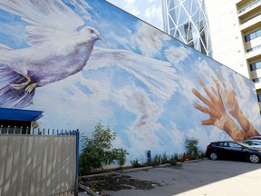 Doug Driediger's mural at the old CUPS building on 7 Ave. S.E., "Giving Wings to the Dream."