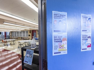 Pictured is a cafeteria in Henry Wise Wood High School where a number of signs reming students to practice precautionary measures on Friday, August 28, 2020. Azin Ghaffari/Postmedia