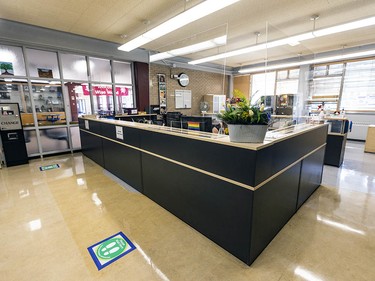 To increase the safety of staff and visitors, glass barriers and standing marks have been placed inside the main office in Henry Wise Wood High School on Friday, August 28, 2020. Azin Ghaffari/Postmedia