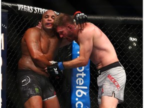 Stipe Miocic throws a punch at Daniel Cormier in the second round during their UFC Heavyweight Title Bout at UFC 241 at the Honda Center on August 17, 2019 in Anaheim, California.