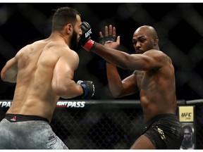 Dominick Reyes and Jon Jones in their UFC Light Heavyweight Championship bout during UFC 247 at Toyota Center on February 08, 2020 in Houston, Texas.