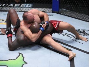 Aleksei Oleinik of Russia works a neck crank against Derrick Lewis in their heavyweight fight during the UFC Fight Night event at UFC APEX on August 08, 2020, in Las Vegas, Nevada. Suppled Photo/UFC