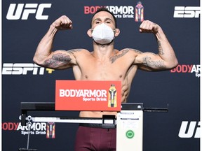 LAS VEGAS, NEVADA - AUGUST 21:  In this handout image provided by UFC,  Frankie Edgar poses on the scale during the UFC Fight Night weigh-in at UFC APEX on August 21, 2020 in Las Vegas, Nevada.