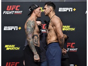 LAS VEGAS, NEVADA - AUGUST 28: In this handout image provided by UFC, (L-R) Opponents Anthony Smith and Aleksandar Rakic of Austria face off during the UFC Fight Night weigh-in at UFC APEX on August 28, 2020 in Las Vegas, Nevada.