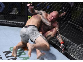 Aleksandar Rakic of Austria grapples with Anthony Smith in their light heavyweight fight during the UFC Fight Night event at UFC APEX on August 29, 2020, in Las Vegas, Nev.
