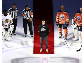 EDMONTON, ALBERTA - AUGUST 01: Mathew Dumba of the Minnesota Wild speaks before the game between the Edmonton Oilers and the Chicago Blackhawks in Game One of the Eastern Conference Qualification Round prior to the 2020 NHL Stanley Cup Playoffs  at Rogers Place on August 01, 2020 in Edmonton, Alberta. Dumba spoke about the NHL's commitment to ending racism.