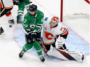 Alexander Radulov of the Dallas Stars skates in front of goaltender Cam Talbot of the Calgary Flames during first-round action of the 2020 NHL Stanley Cup playoffs.