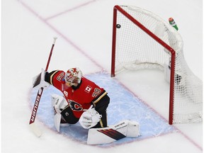 EDMONTON, ALBERTA - AUGUST 14:  Cam Talbot #39 of the Calgary Flames stops a shot against the Dallas Stars during the first period in Game Two of the Western Conference First Round during the 2020 NHL Stanley Cup Playoffs at Rogers Place on August 14, 2020 in Edmonton, Alberta, Canada. (Photo by Jeff Vinnick/Getty Images)