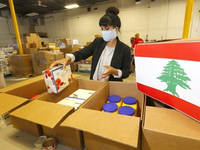 Leela Aheer, Minister of Culture, Multiculturalism and Status of Women, helped out as the Alberta Muslim Social Association (AMSA), hosted the Calgary to Beirut container loading event. Calgary's Lebanese community loaded relief supplies in bound for Beirut on Saturday, August 15, 2020.