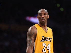 In this file photo taken on November 21, 2015 Kobe Bryant (24) of the Los Angeles Lakers looks on during the Lakers NBA match up with the Toronto Raptors, at Staples Center in Los Angeles, California.