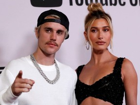 Singer Justin Bieber and his wife Hailey Baldwin pose at the premiere for the documentary television series "Justin Bieber: Seasons" in Los Angeles, Jan. 27, 2020.