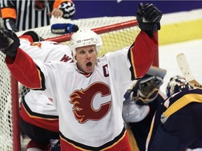 Then-Calgary Flames captain Dave Lowry celebrates after scoring a goal against the Nashville Predators at the Saddledome in Calgary on Jan. 11, 2001. Postmedia Network file