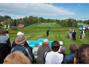 Fans watch as players tee off on the first hole in Round 1 of the Shaw Charity Classic at the Canyon Meadows Golf Club in Calgary on Friday September 2, 2016. Gavin Young/Postmedia