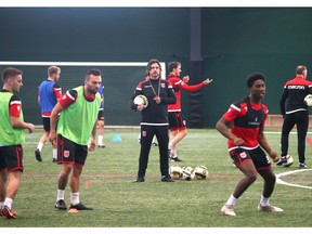 Cavalry FC coach/GM Tommy Wheeldon Jr (centre) oversees a drill during training camp for the CPL team at the Macron Performance Centre in Calgary on March 2, 2020. Jim Wells/Postmedia