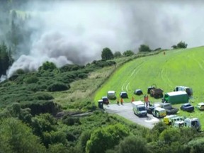 Emergency services at the scene of a train derailment in Scotland in this screengrab of a Reuters' video.