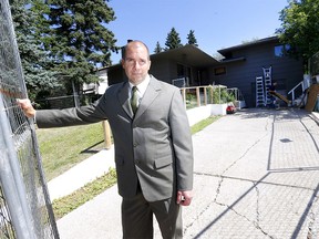 Mike Letourneau, Justice and Solicitor General for the SCAN unit, Alberta Sheriff, shuts down a drug house at 204 Cardiff Dr. N.W. in Calgary after a year long investigation of complaints on drugs, weapons and fire arms being fired off at the home on Tuesday, August 4, 2020.