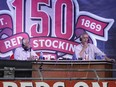 Cincinnati Reds radio broadcaster Marty Brennaman and his son Thom Brennaman call the game against the Milwaukee Brewers from the lower seating level at Great American Ball Park on September 25, 2019 in Cincinnati, Ohio.