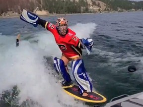Lisa "Longball" Vlooswyk is seen here wakeboarding in goalie gear in a video posted on the first da of the Flames' series against the Dallas Stars.