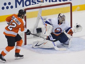 New York Islanders goaltender Semyon Varlamov makes a save against Philadelphia Flyers right wing Nicolas Aube-Kubel during the third period in game one of the second round of the 2020 Stanley Cup Playoffs at Scotiabank Arena.