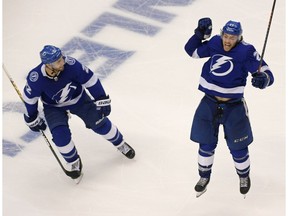 Aug 11, 2020; Toronto, Ontario, CAN; Tampa Bay Lightning center Brayden Point (21) celebrates after scoring the game-winning goal against the Columbus Blue Jackets in the fifth overtime in game one of the first round of the 2020 Stanley Cup Playoffs at Scotiabank Arena. Mandatory Credit: Dan Hamilton-USA TODAY Sports ORG XMIT: USATSI-429676