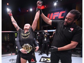 Amanda Nunes of Brazil celebrates after her unanimous-decision victory over Felicia Spencer of Canada in their UFC featherweight championship bout during UFC 250 at the UFC APEX. Jeff Bottari/Zuffa LLC via USA TODAY Sports