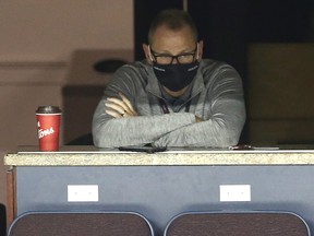 Flames GM Brad Treliving watches his team practice at the Saddledome on July 16, 2020, prior to the start of NHL playoffs.
