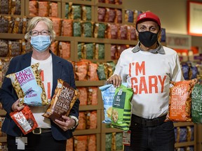 Chris Gruber, private brands senior director, left, and Ken Keelor, CEO of Calgary Co-op, pose for a photo at the launching event of their Calgary-centric private brands, Cal & Gary’s and Founders & Farmers, at their Macleod Trail location on Thursday, September 17, 2020.