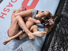 Mackenzie Dern secures an arm bar submission against Randa Markos in their strawweight bout on Sept. 19, 2020. Zuffa/LLC via Getty Images