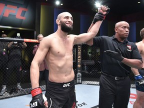 Khamzat Chimaev celebrates after his knockout victory over Gerald Meerschaert in their middleweight bout on Sept. 19, 2020. Zuffa/LLC via Getty Images