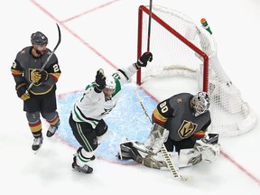 The Dallas Stars’ Corey Perry celebrates as the game-winning goal by teammate Denis Gurianov goes past Vegas Golden Knights goaltender Robin Lehner to give the Stars a 3-2 overtime victory in Game 5 of the Western Conference Final at Rogers Place in Edmonton on Sept. 14, 2020. Bruce Bennett/Getty Images