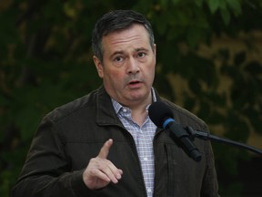 Alberta Premier Jason Kenney answers questions after announcing $43 million in repairs and improvements to provincial parks at a news conference in Calgary, Alta., Tuesday, Sept. 15, 2020.