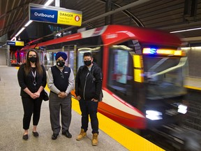 Shayla Kuefler, right, met Calgary Transit CTrain operator Gurmeja Cheema and call centre representative Brooke Richmond after the two transit employees were quickly able to find the $1500 in cash that Kuefler accidentally left behind in a bag on a train.The money was a critical rent payment for Kuefler who is currently on AISH. The trio were photographed a the Westbrook CTrain station on Tuesday, September 15, 2020.