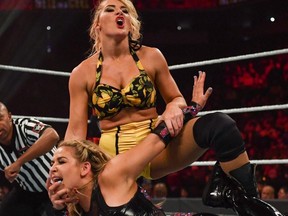 Natalya faces adversity during a match against Lacey Evans.