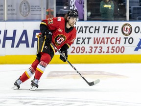 Justin Kirkland, a 24-year-old forward, re-upped Monday with the Flames, scribbling his signature on another one-year, two-way contract after spending all of last winter with the farm team in Stockton, Calif.