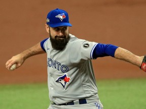 Blue Jays starting pitcher Matt Shoemaker delivers against the Rays during Game 1 of their American League Wild Card Series on Tuesday in St. Petersburg, Fla. Shoemaker was terrific through three innings, and then was removed from the game, as per his team's pre-determined game-plan.