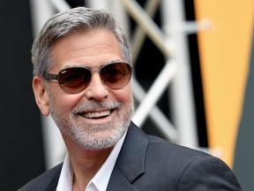 In this file photo taken on May 13, 2019 US actor and film director George Clooney poses during a photocall of the Catch-22 TV show in Rome.