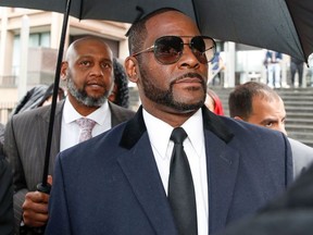 In this file photo taken on May 7, 2019, singer R. Kelly leaves the Leighton Criminal Court Building after a hearing on sexual abuse charges, in Chicago, Illinois.