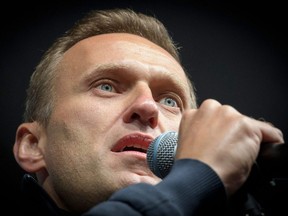 Russian opposition leader Alexei Navalny delivers a speech during a demonstration in Moscow, Sept. 29, 2019.