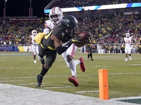 Oregon wide receiver Jaylon Redd is pushed out of bounds by Utah defensive back Josh Nurse short of the goal line during the first half of the Pac-12 Conference championship game in Santa Clara, Calif., on Dec. 6, 2019. Tony Avelar/The Associated Press