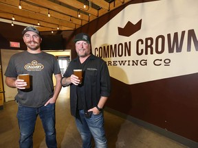 Head brewer Tyler Rose, left, and co-founder Damon Moreau at Common Crown Brewing in Calgary on Tuesday, Sept. 15, 2020.