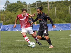 Canadian Premier League - Forge FC vs Cavalry FC - Charlottetown, PEI- Sept 15, 2020]. Cavalry FC #5 Mason Trafford with possession