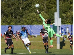 Canadian Premier League - HFX Wanderers vs Cavalry FC - Charlottetown, PEI- Sept 12, 2020]. Cavalry FC #1 Marco Carducci with the touch and save